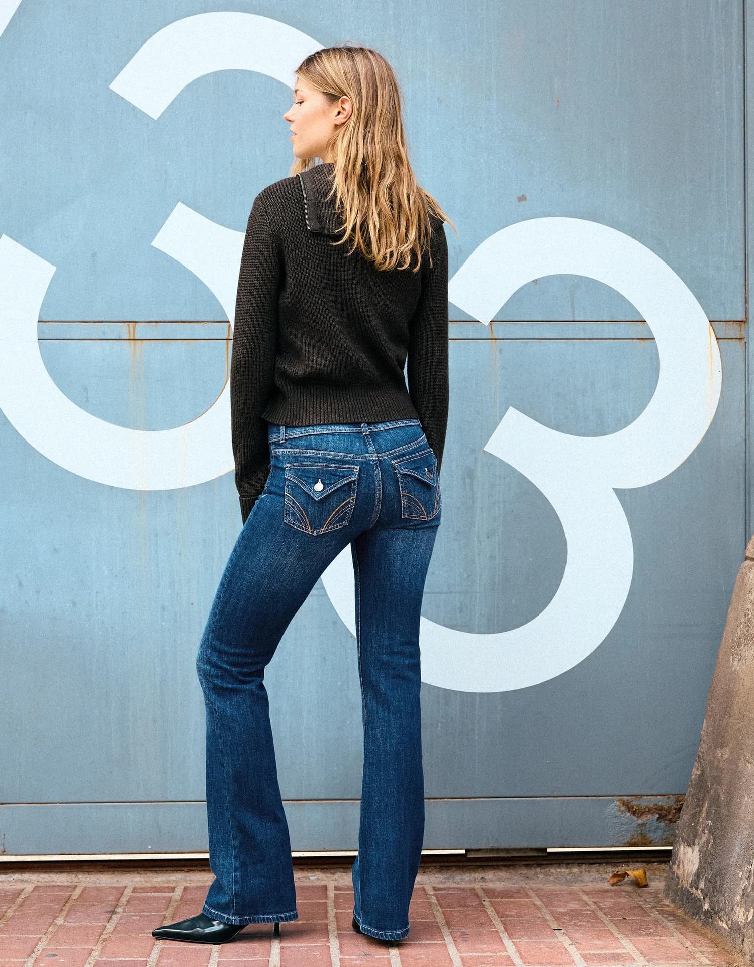 Calça Jeans Bootcut com Lapelas